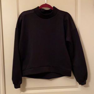 Black sporty sweater with mesh back